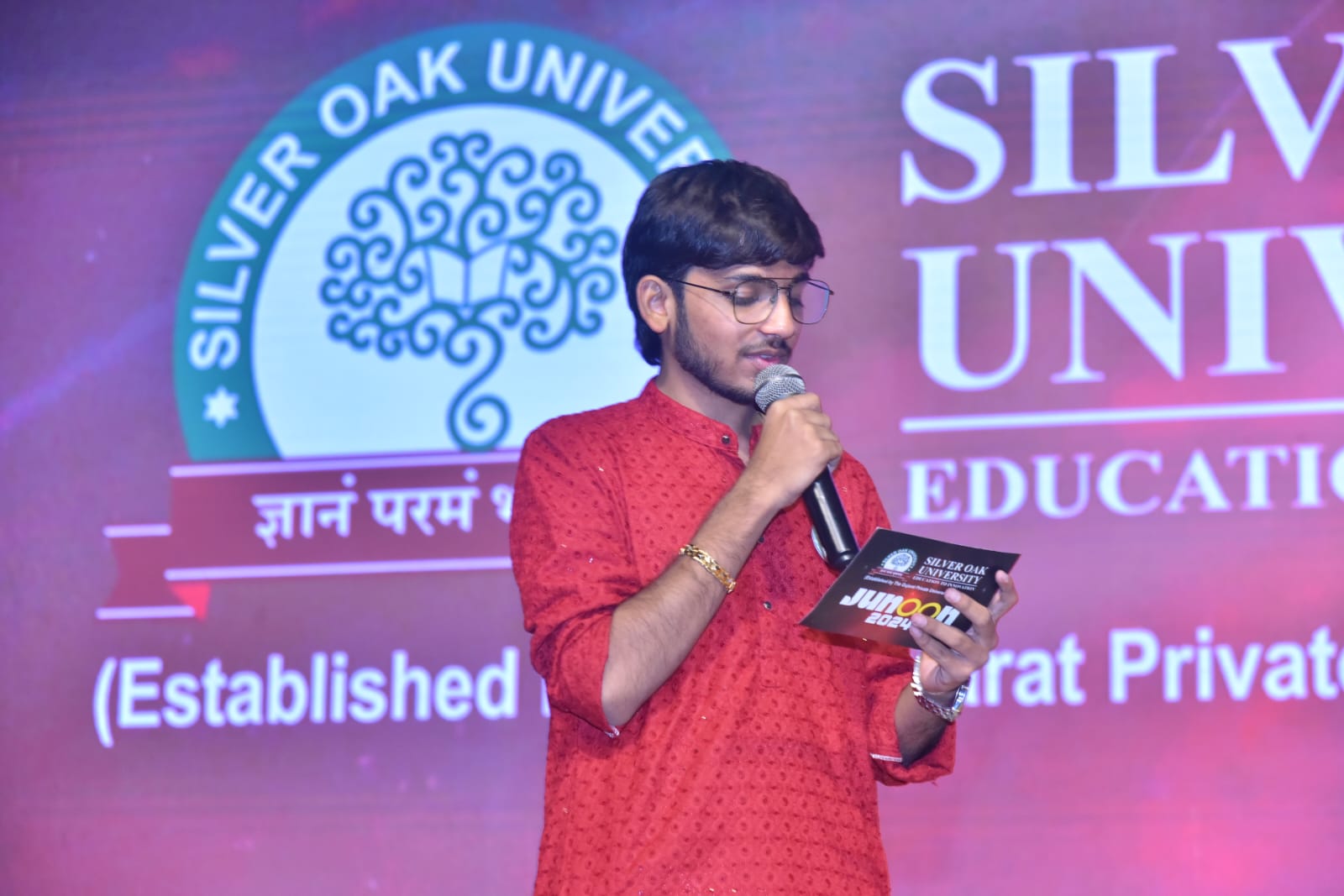 Professional anchor at event with microphone